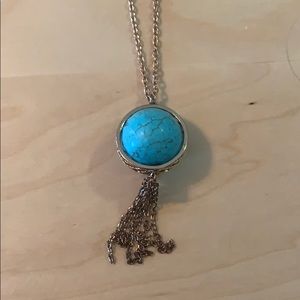 Blue ball on gold chain